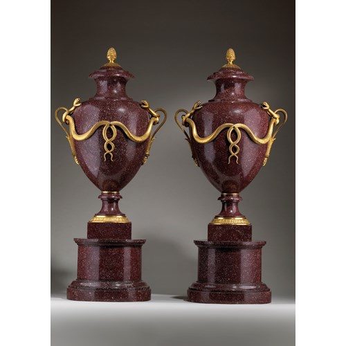 A Pair of Ormolu-mounted Imperial Porphyry Urns and Covers on Stands